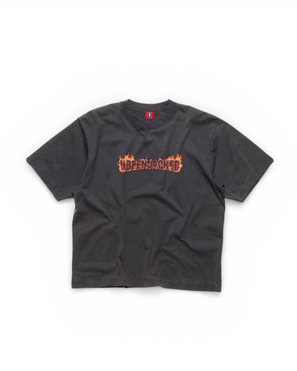 Black t-shirt with orange text on a white background