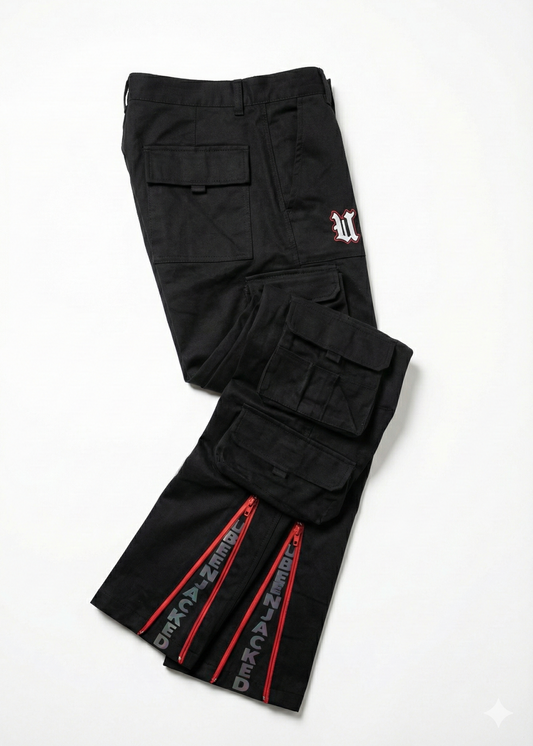 Black cargo pants with red zippers on a white background