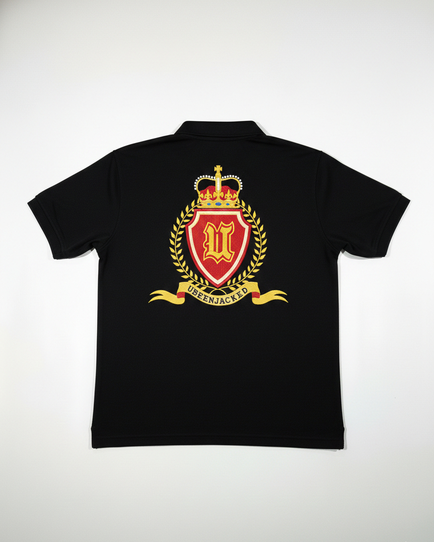 Black polo shirt with a red and gold emblem on the back against a white background