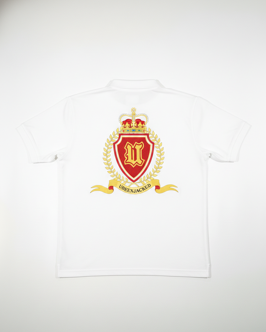 White polo with a red and gold emblem on a white background