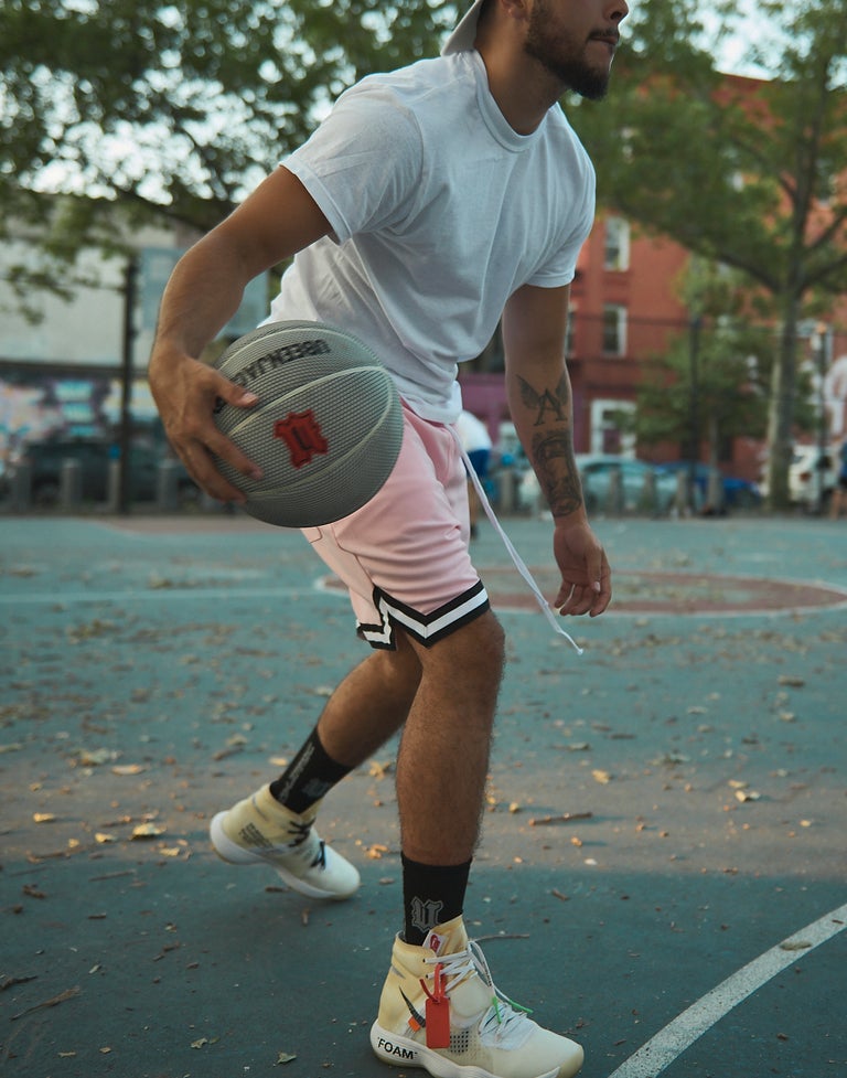 black ubeenjacked socks on model playing basketball